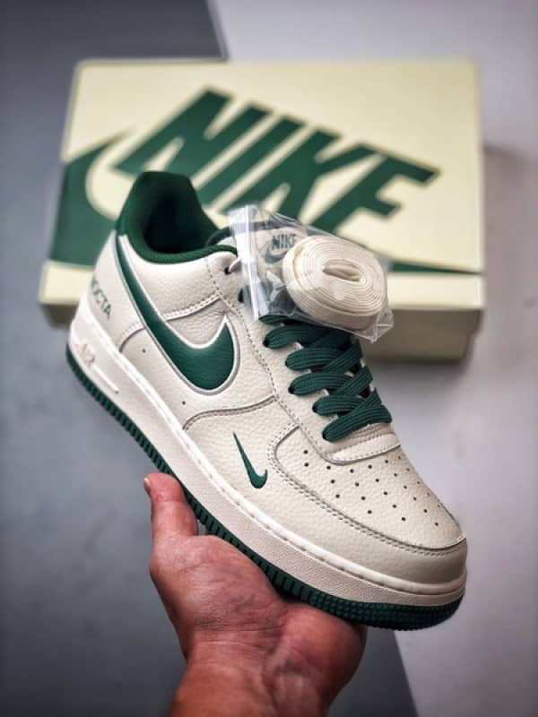 NOCTA x Air Force 1 Low Creme e Verde